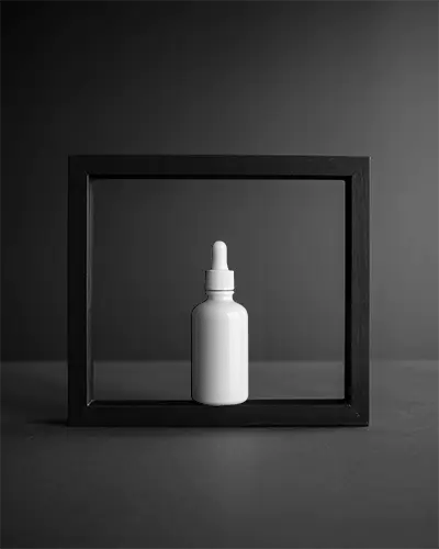 Minimalist Dropper Bottle Mockup Framed In Black Modern Monochrome Aesthetic