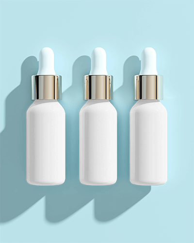 Dropper Bottle Mockup With Gold Cap On Pastel Blue Background Soft Shadows And Elegant Lighting 042