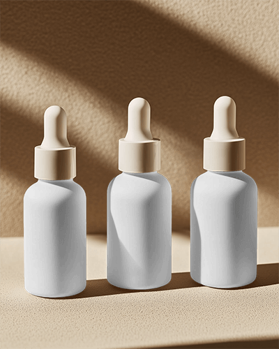 Dropper Bottle Mockup Three Bottles Warm Neutral Tones Soft Shadows Natural 058