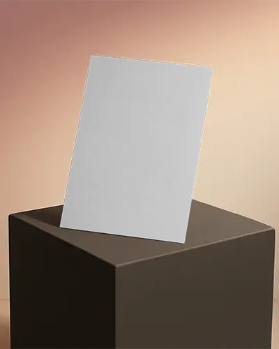 Studio Lit Flyer Mockup On Matte Brown Pedestal With Warm Gradient Background And Balanced Composition