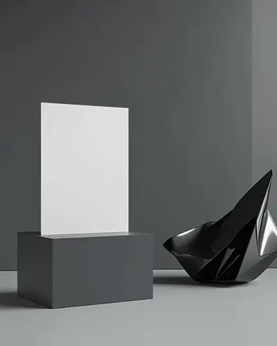 Modern Art Flyer Mockup On Grey Pedestal With Abstract Black Sculpture In Minimalist Architectural Space