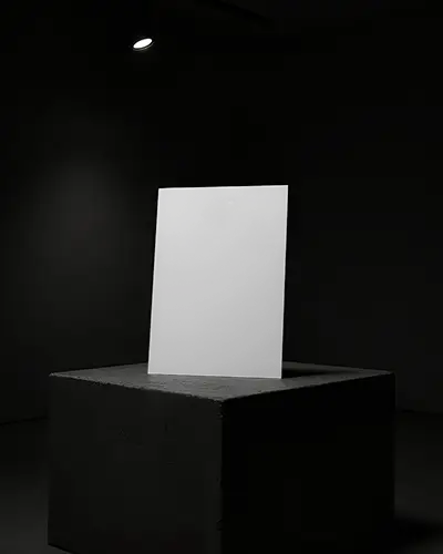 Spotlight Lit A6 Flyer Mockup On Dark Textured Pedestal Moody Black Background High Contrast