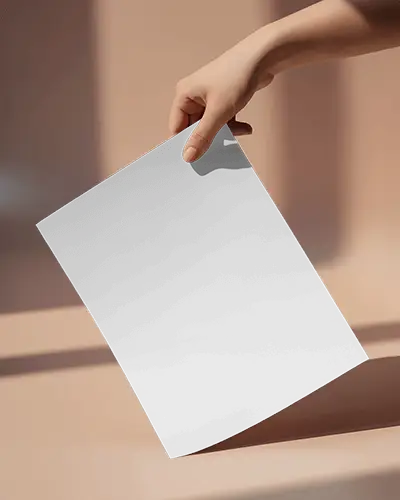 Elegant Hand Holding Flyer Mockup Warm Beige Setting With Dramatic Shadows