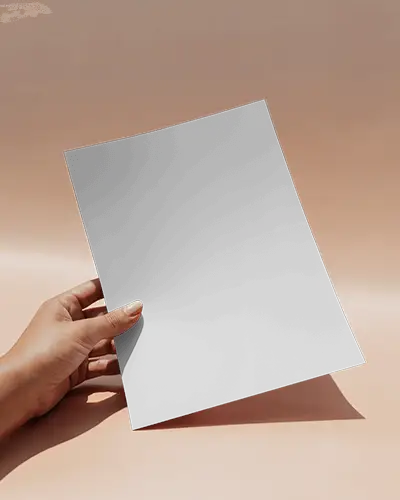 Minimal Hand Holding Flyer Mockup On Beige Backdrop With Soft Shadows And Natural Sunlight