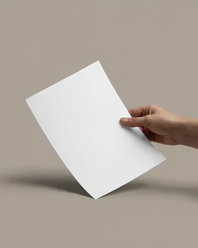 Hand Holding Flyer Mockup On Neutral Background With Subtle Shadow And Minimalist Lighting