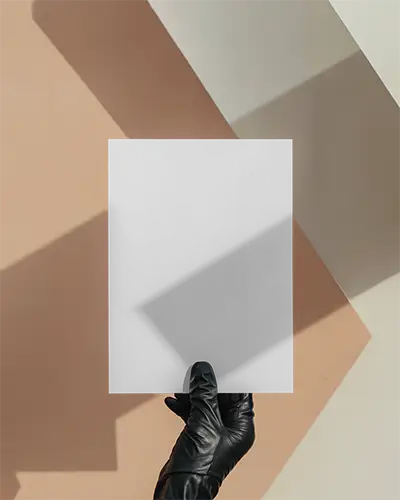 sleek-minimalist-flyer-mockup-held-with-gloved-hand-with-modern-shadow-play-background-0370