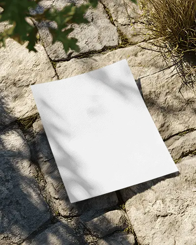 blank-flyer-mockup-on-textured-stone-floor-with-natural-shadow-overlay