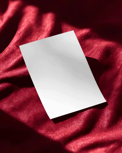 blank-paper-flyer-mockup-with-soft-shadow-effect-on-pleated-fabric-for-design-preview