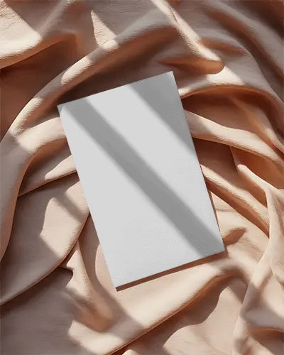 minimalistic-flyer-mockup-on-soft-fabric-background-for-branding-presentation-purposes