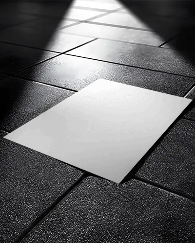 Blank Flyer Mockup On Textured Floor Under Spotlight For Design Presentation Usage