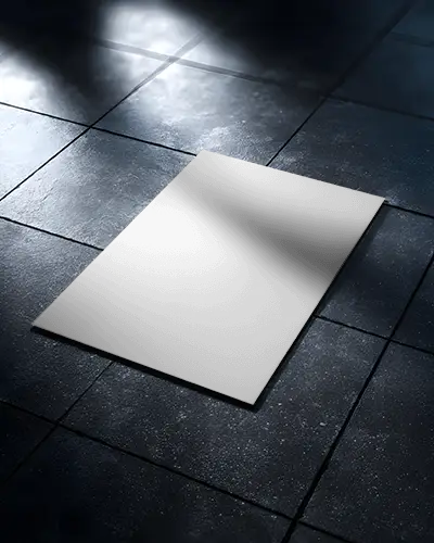 Photorealistic Flyer Mockup On Textured Tile Floor With Natural Light Shadows