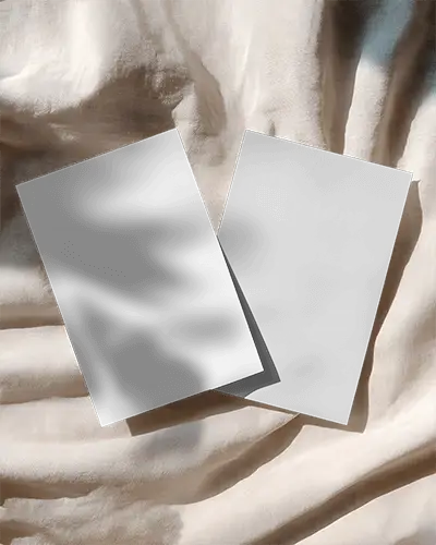 Realistic Flat Flyer Template Placed On Soft Textured Cloth For Design Presentation