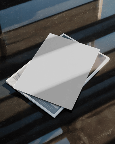 Blank Flyer Mockup On Marble Surface With Natural Light For Design Presentation