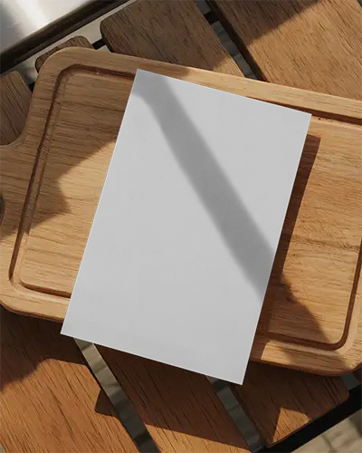 Minimalist Flyer Mockup On Wood Table With Natural Light Shadow Effects