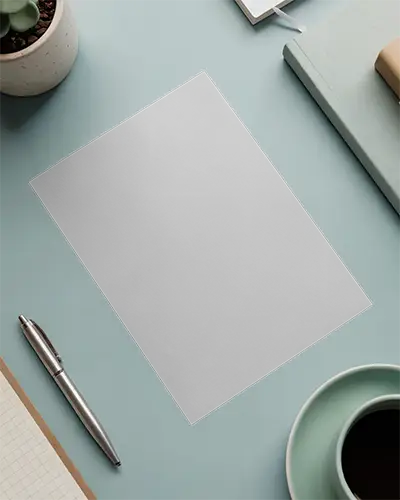 Blank Flyer Mockup On Clean Minimalist Desk With Office Supplies And Plant