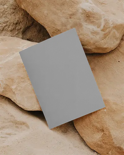 Vertical Paper Flyer Mockup Placed On Rough Stone Background For Design Showcase