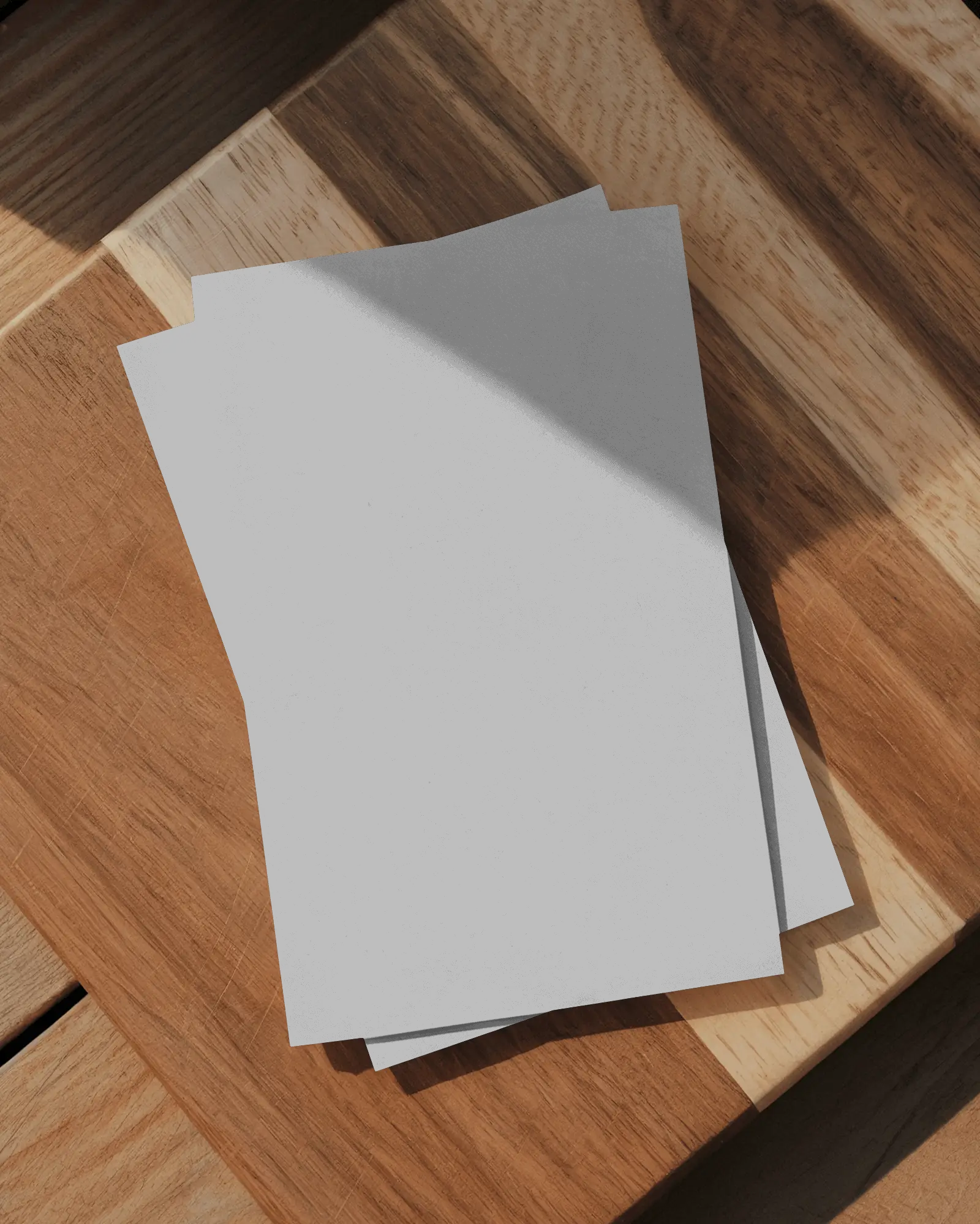 Stacked Minimalist Flyer Mockup On Wood Surface For Modern Marketing
