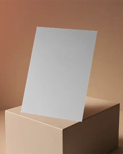 Soft Beige Flyer Mockup On Cuboid Pedestal Against Neutral Gradient Wall With Clean Balanced Light