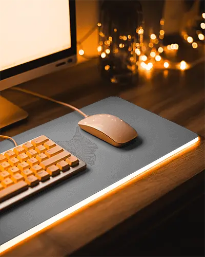 Warm Ambient Gaming Pad Mockup With Soft Orange Lighting And Modern Desk Setup