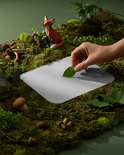 Enchanted Forest Gaming Pad Mockup With Moss Leaves And Miniature Fox Figure