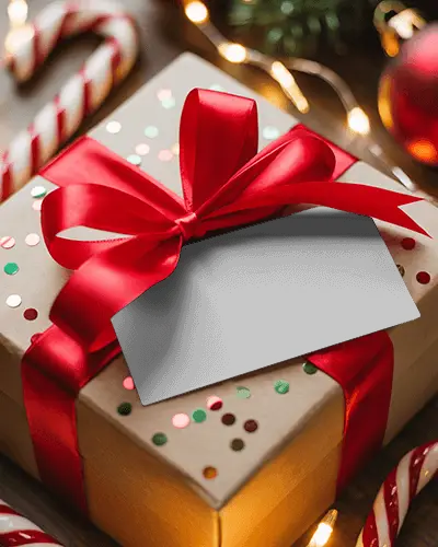 Christmas Gift Box Greeting Card Mockup Festive Present With Red Ribbon Bow And Holiday Lights