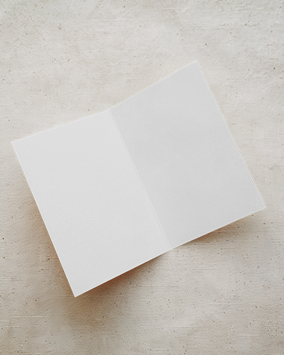 Open Greeting Card Mockup On Neutral Fabric Background With Clean Texture And Soft Lighting Minimal And Versatile Scene