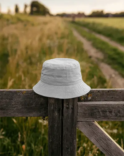 Stylish Casual Outdoor Bucket Hat Mokcup On Rustic Wooden Fence For Summer Adventure Wear