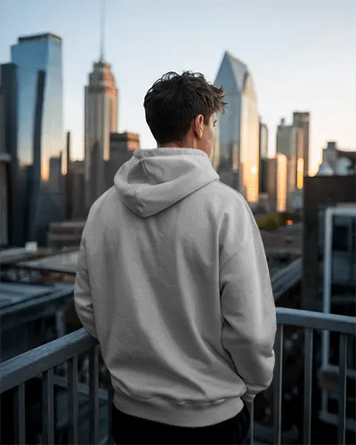 Modern Hoodie Mockup With Man Overlooking Cityscape During Golden Hour Urban Style Shot