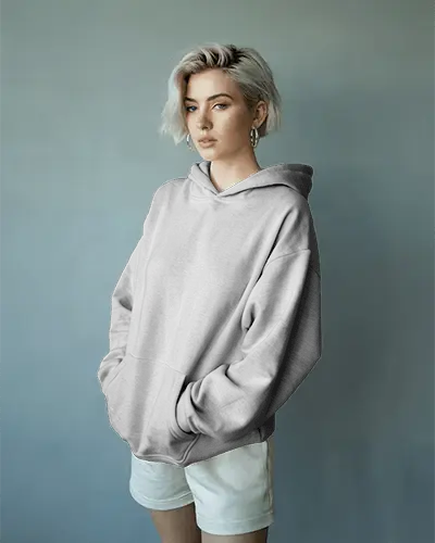 Modern Studio Hoodie Mockup Female Model In Minimal Lighting With Soft Neutral Background