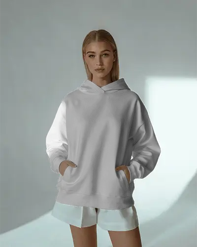 Sunlit Studio Hoodie Mockup Female Model In Relaxed Pose Soft Shadows Clean Minimal Style