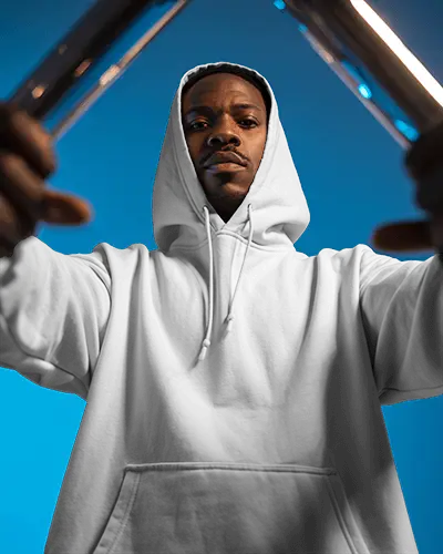 Blue Studio Bars Hoodie Mockup Male Model Forward Gaze Dramatic Frame