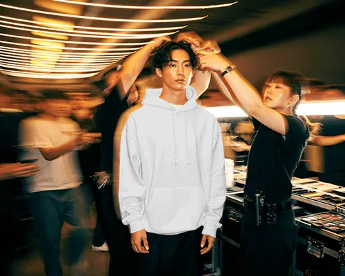 Professional Model Wearing Blank Hoodie Mockup In Studio Environment