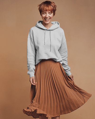 Mustard Yellow Hoodie Mockup Female Model Smiling Twirling Pleated Skirt Playful Aesthetic