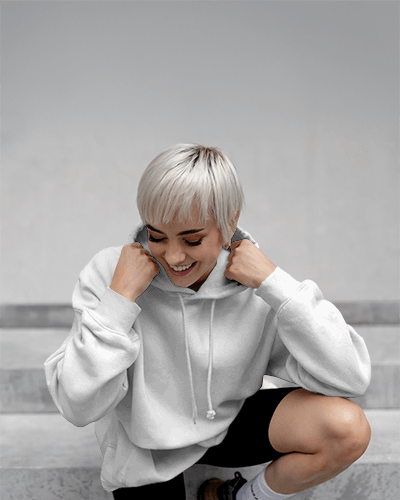 Casual Female Model Hoodie Mockup Sitting Marble Steps Graphic Art