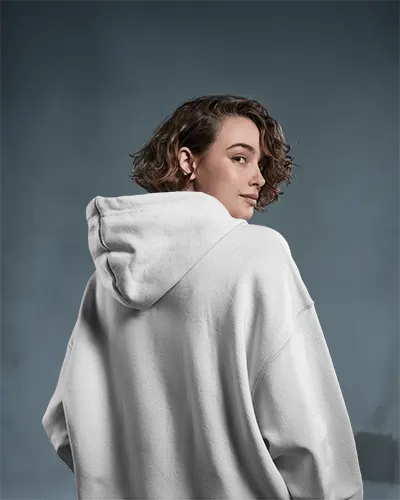 Cozy Back View Hoodie Mockup On Woman In Minimal Studio Setting With Muted Tones And Subtle Lighting