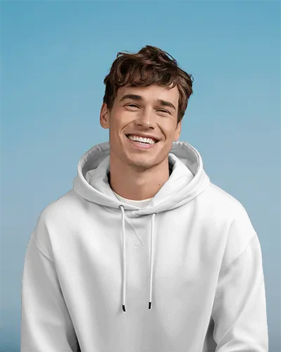Bright Sky Backdrop Hoodie Mockup Smiling Male Model Front View Shot