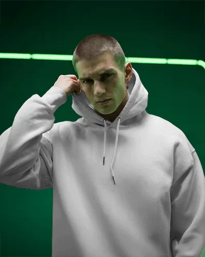 Urban Vibe Hoodie Mockup Edgy Male Model In Hooded Sweatshirt Under Neon Light