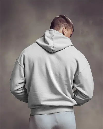 Soft Studio Hoodie Mockup Back View Male Model In Hoodie Looking Away Moody Lighting