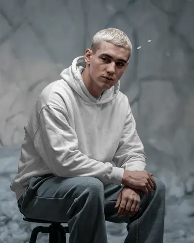 Cool Toned Hoodie Mockup Bleached Hair Man In Hoodie In Stylized Grey Background