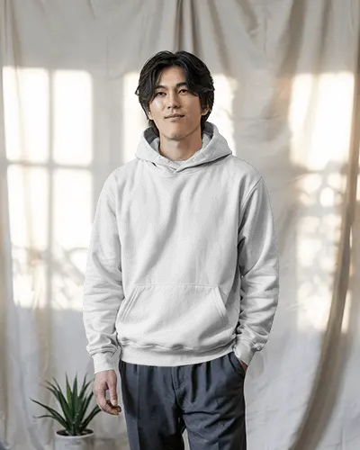 Sunlit Curtain Backdrop Hoodie Mockup Male Model Standing Calmly In Natural Light