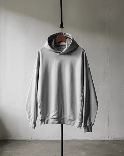 Front View Urban Style Hoodie Mockup On Standalone Hanger In Natural Light