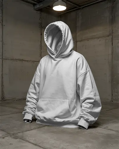 Blank Hooded Sweatshirt Mockup On Warehouse Floor For Urban Streetwear Designs