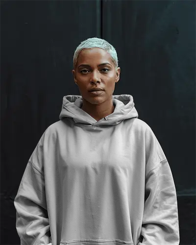 Streetwear Hoodie Mockup Woman With Bleached Hair Standing Against Dark Wall Modern Aesthetic