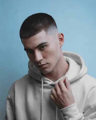 Designer Cropped Hoodie Mockup Female Model In Monochrome Outfit Oversized Silhouette With Raw Edge Hem Paris Fashion Week Vibes