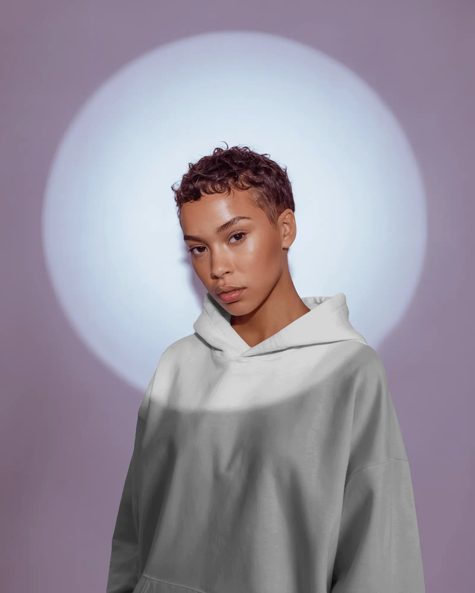 Stylish Female Hoodie Mockup Against Pastel Backdrop For Modern Apparel Designs