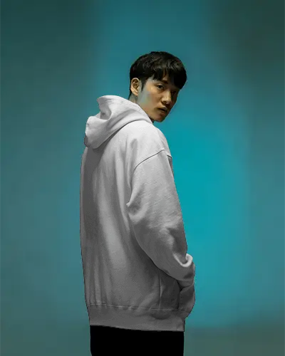 Back View White Hoodie Mockup On Male Model With Vibrant Blue Backdrop