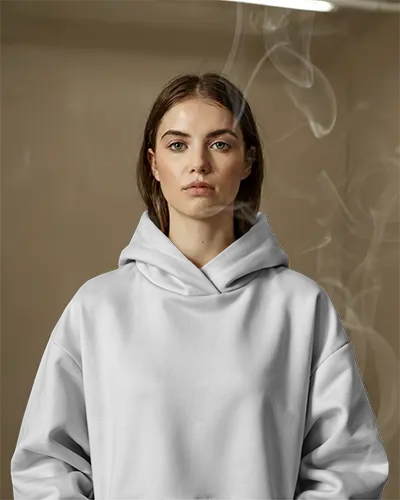 White Hoodie Mockup Front View Woman Facing Forward Subtle Steam In Air Neutral Background Focus On Chest Design Relaxed Casual Style