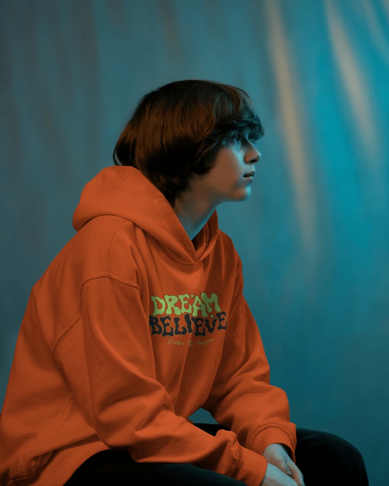 Contemplative Boy Hoodie Mockup Soft Blue Tones And Shadowed Portrait Scene