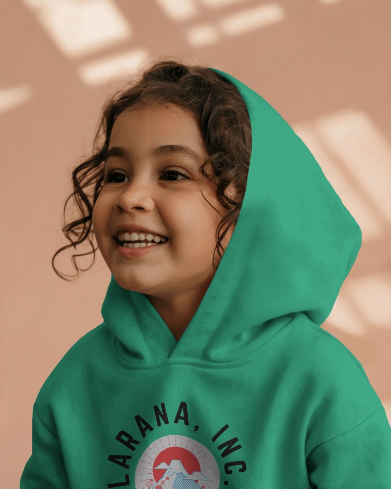 Smiling Young Girl Hoodie Mockup Warm Peach Tones Clean White Apparel