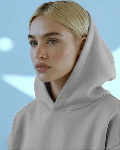 Close Up Hoodie Mockup Blonde Female Model Wearing Light Grey Hoodie In Soft Blue Background Modern Lighting Scene 0703